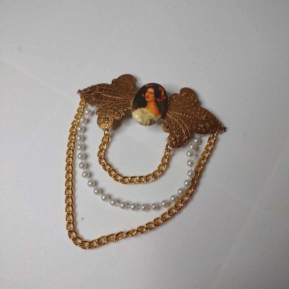 Large Gold Tone Chained Portrait Brooch